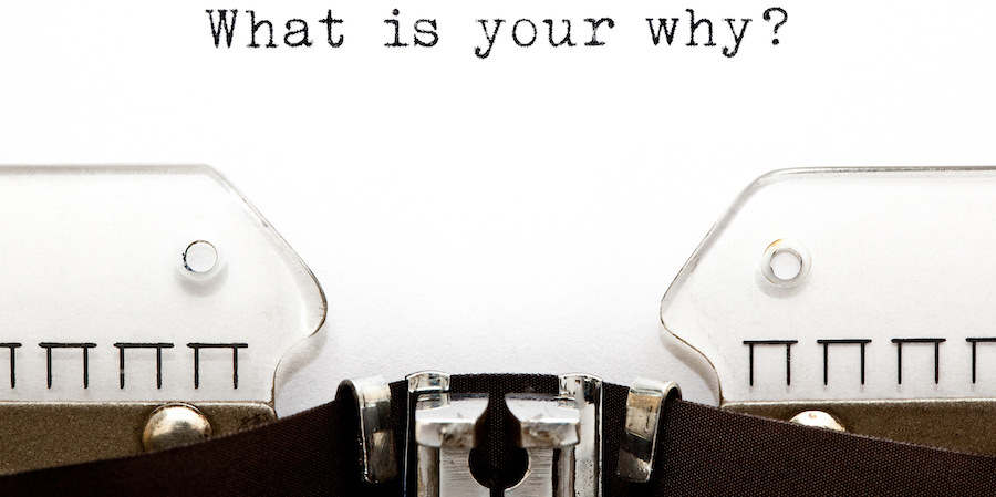 Typewriter spelling out "What is your Why?"